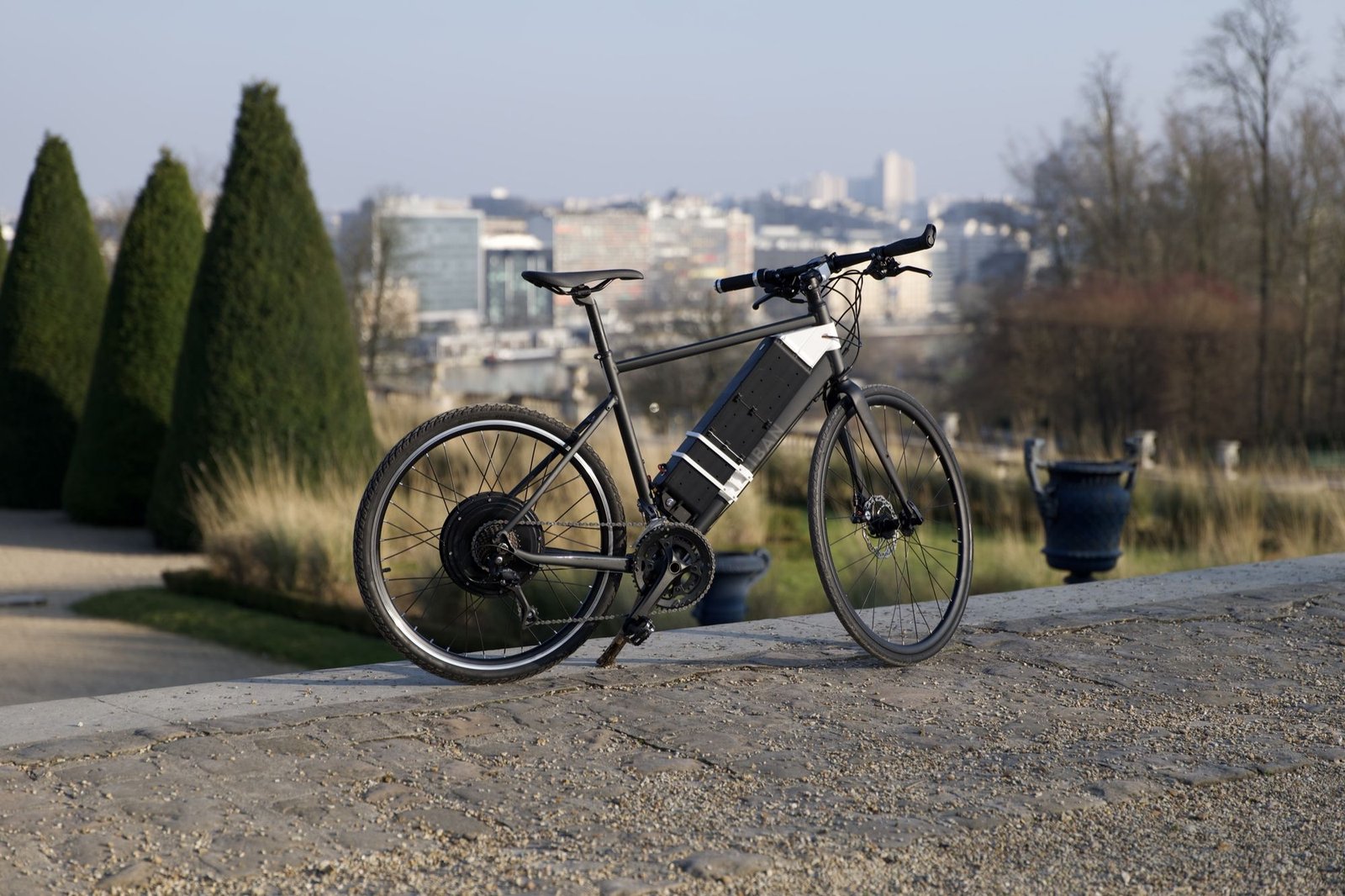 The Styx bike with the city behind